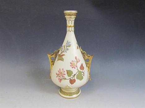 A late 19c Royal Worcester gilt and floral decorated two handled pedestal vase of baluster form with tapering neck, stamped t