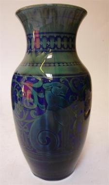 A PILKINGTON`S ROYAL LANCASTRIAN EARTHENWARE VASE designed by Richard Joyce, of baluster form, painted in a dull green with h