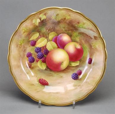 A Royal Worcester plate decorated by A. Shuck with windfall fruit, within gilt-line border, 22.5cm diameter, puce marks, date