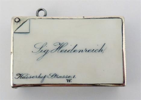 A Victorian silver calling card vesta case, by George Unite, Birmingham 1888, of rectangular form enamelled &#8216;Sig Heiden