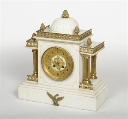 * A late 19th century French white marble striking mantel clock of architectural form 