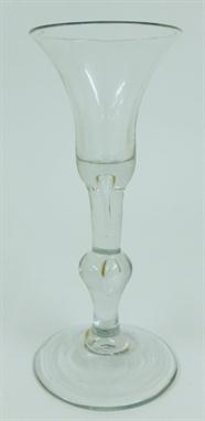 A Baluster Wine Glass, circa 1750, the bell shape bowl on stem with air tear and basal baluster knop, circular foot, 16.5cm h