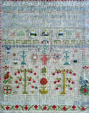 A Victorian needlework alphabet sampler by 