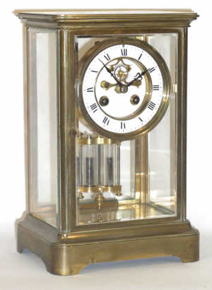 A French brass eight-day four-glass mantel clock, circa 1890, the bell-striking movement with mer