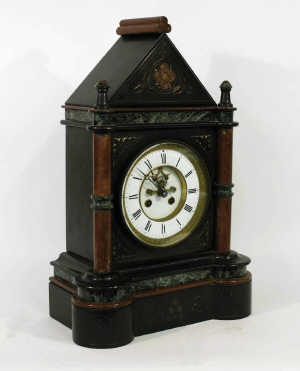 A French Gothic Revival belge noir, red and green marble eight-day mantel clock circa 1870, the b