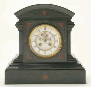 A late 19th century French belge noir marble mantel clock retailed by Parsons & Son, Bristol, the