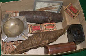 A mixed collection, incl tobacco plug, three boxes of Braided cigar lights, etc.