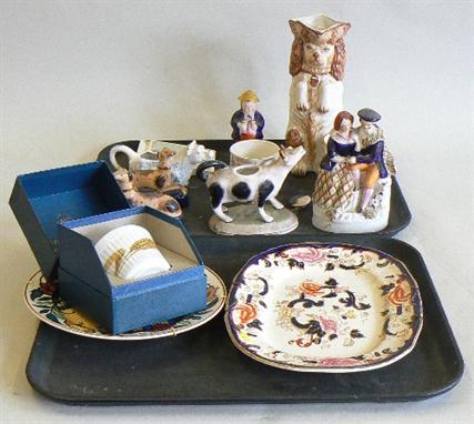 Staffordshire group, a toby cruet, two cow creamers, reproduction pair of greyhounds and a Charles Spaniel, two 19th century 