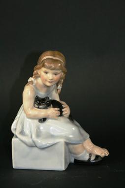 RARE DOULTON &amp; CO FIGURE - PUSSY HN 18, designed by F C Stone, the figure in a light blue dress and holding a cat in her 