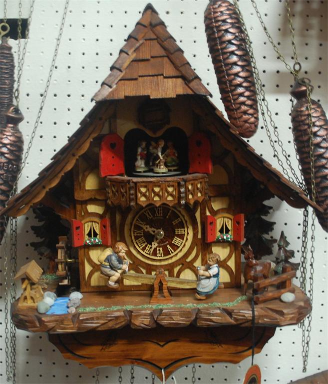 A large Schneider three train cuckoo clock