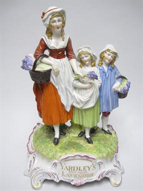 A Yardley`s Old English Lavender Advertising Figure Group with painted details, 12in, titled and a Pilkington`s Lancastrian G