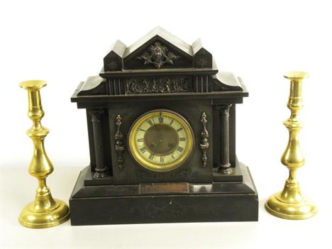 A belgian slate architectural style mantel clock with engraved brass tablet dated 1901 and a pair of victorian brass candlest
