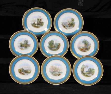 A MINTON DESSERT SERVICE painted with English landscapes reserved on a vivid turquoise ground in gilt Greek key border, the s