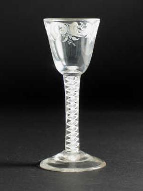 A good Beilby wine glass, the bowl enamelled with a band of scrolls and pendant leaf sprigs and raised on a single  series op