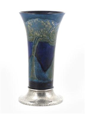 `Moonlit Blue` a Moorcroft Pottery vase with Liberty Tudric Pewter foot, designed by William Moorcroft, shape 01310, painted 