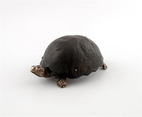 A Victorian novelty silver mounted tortoise table vesta case, by H. Thornhill, London 1887, modelled as a standing tortoise, 