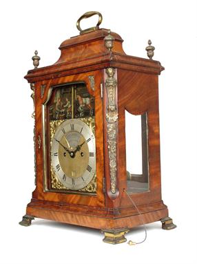 A George III striking mahogany bracket with automaton, the 7 inch brass dial signed on a recessed silvered plaque in the matt