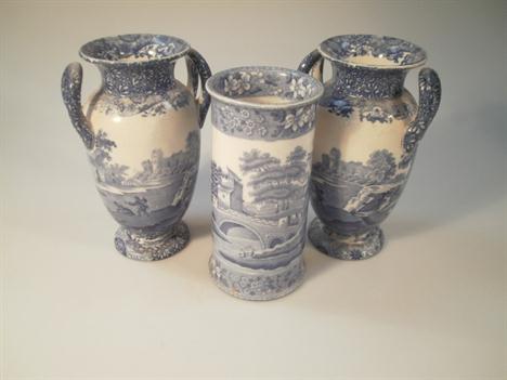 A pair of Copeland Spode blue and white Italian pattern two handled vases, transfer printed mark, 22cm high; and a cylindrica