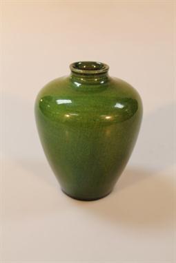 A Pilkington Lancastrian ovoid vase, plain design with green glazed decoration, impressed mark to the foot, 10cm high.