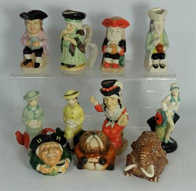 A collection of Kevin Francis pottery to include miniature figures Clarice Cliffe, Susie Cooper, various miniature Toby jugs 
