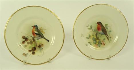 &quot;WILLIAM POWELL A PAIR OF ROYAL WORCESTER PORCELAIN WALL PLATES, one hand painted with Robin, the other with a Chaffinch