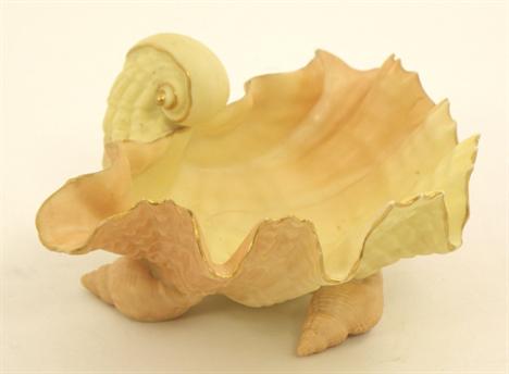 A ROYAL WORCESTER SCALLOP SHELL PATTERN DISH, all over decorated in matt blush ivory, on three shell feet, ref. 971, date cod