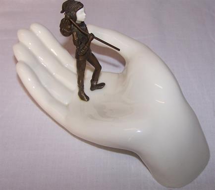 A Minton bronze and porcelain figure &quot;Tom Thumb&quot; MS52 designed by Eric Griffiths. (mark erased).