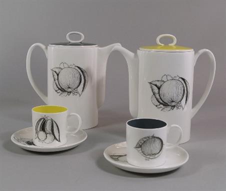 A Susie Cooper 'Black Fruit' pattern part coffee service for Wedgwood, 20th century, with printed design of fruits upon white