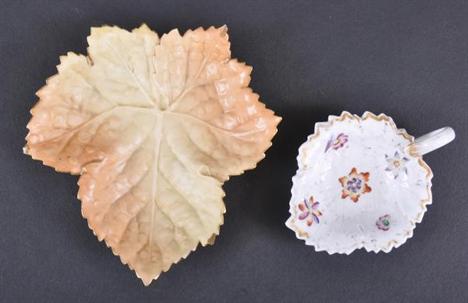 A ROYAL WORCESTER BLUSH IVORY LEAF SHAPED DISH together with a smaller late 19th century continental pickle dish. First with 