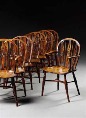 A pair of fine George IV yew-wood and elm Windsor armchairs by Robert  Prior, Uxbridge and a set of six similar  standard Win