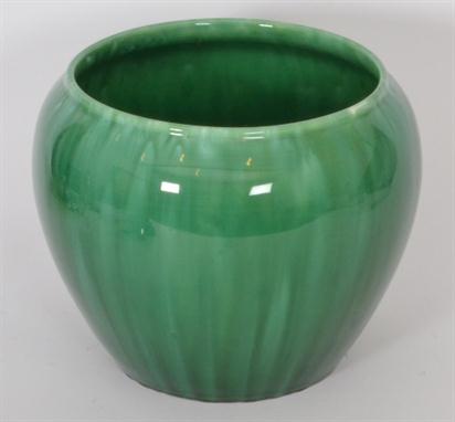 A 1930`s Pilkingtons Royal Lancastrian jardiniere decorated in an all over green glaze, impressed marks, height 24cm