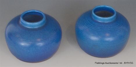 A pair of 1930`s Pilkingtons Royal Lancastrian vase of compressed ovoid form decorated in a royal blue glaze, impressed marks