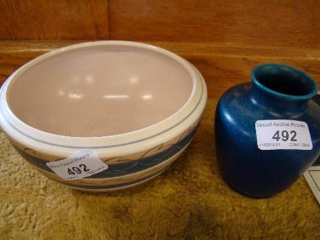 A 1950s Poole Pottery bowl probably designed by Alfred Read, signed with the painter`s initials and a small Royal Lancastrian