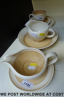 Susie Cooper 'Spirals Old Gold',  pattern no. 2360 gravy boat & saucer, trio, milk jug and dish (19.5 cms) Produced between 1