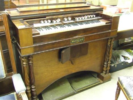 A 19th century rosewood French harmonium imported by Metzler &amp; Co for Alexandre et Fils, Paris 