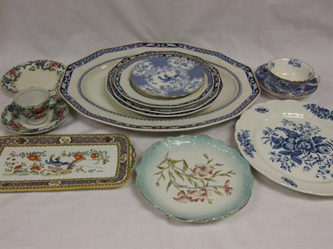 A quantity of mostly blue and white porcelain comprising a blue and white meat platter with three matching plates c. 1920, a 