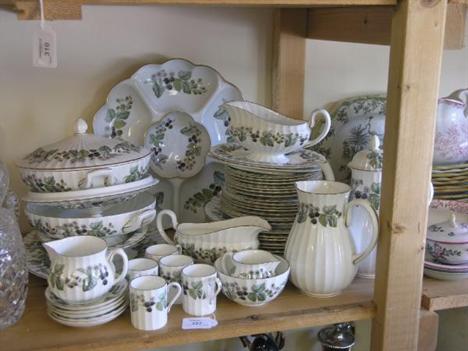A Royal Worcester dinner and coffee service, forty-five pieces for a six-place setting, including hors d`oeuvres a grape and 