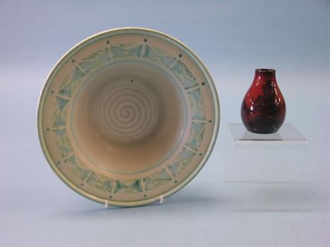 A Pilkington`s Royal Lancastrian earthenware dish, Lapis series in blue and green, potted by E. T. Radford, painted by Gwlady