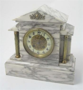 A late 19th/early 20th century French marble cased eight day mantel clock of architectural form, the dial marked WR Bullen, f