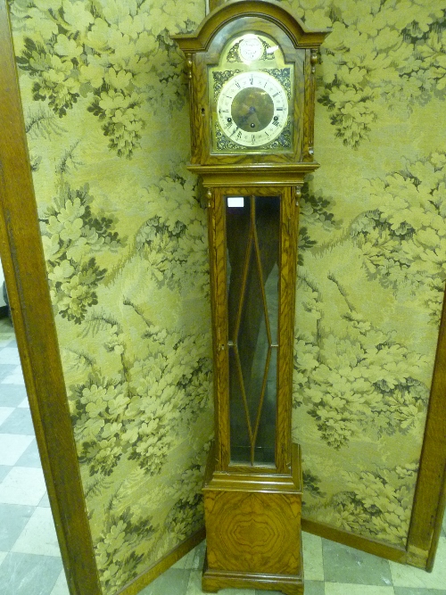 A WALNUT CASED GRANDMOTHER CLOCK WITH A TEMPUS FUGIT BRASS FACE AND