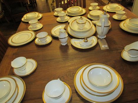 A comprehensive Royal Doulton dinner and tea service, 'Royal Gold' pattern (second quality), together with six Minton pattern